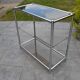 Console/étagère sur pied en acier chromé et verre fumé