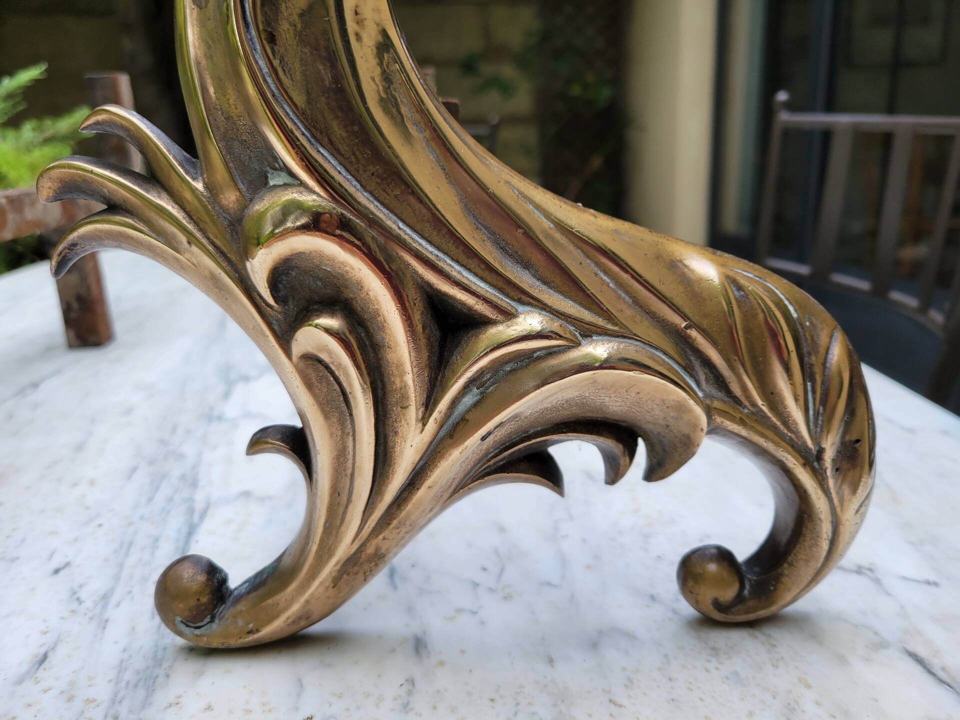 Gilded bronze chenets from the 19th century