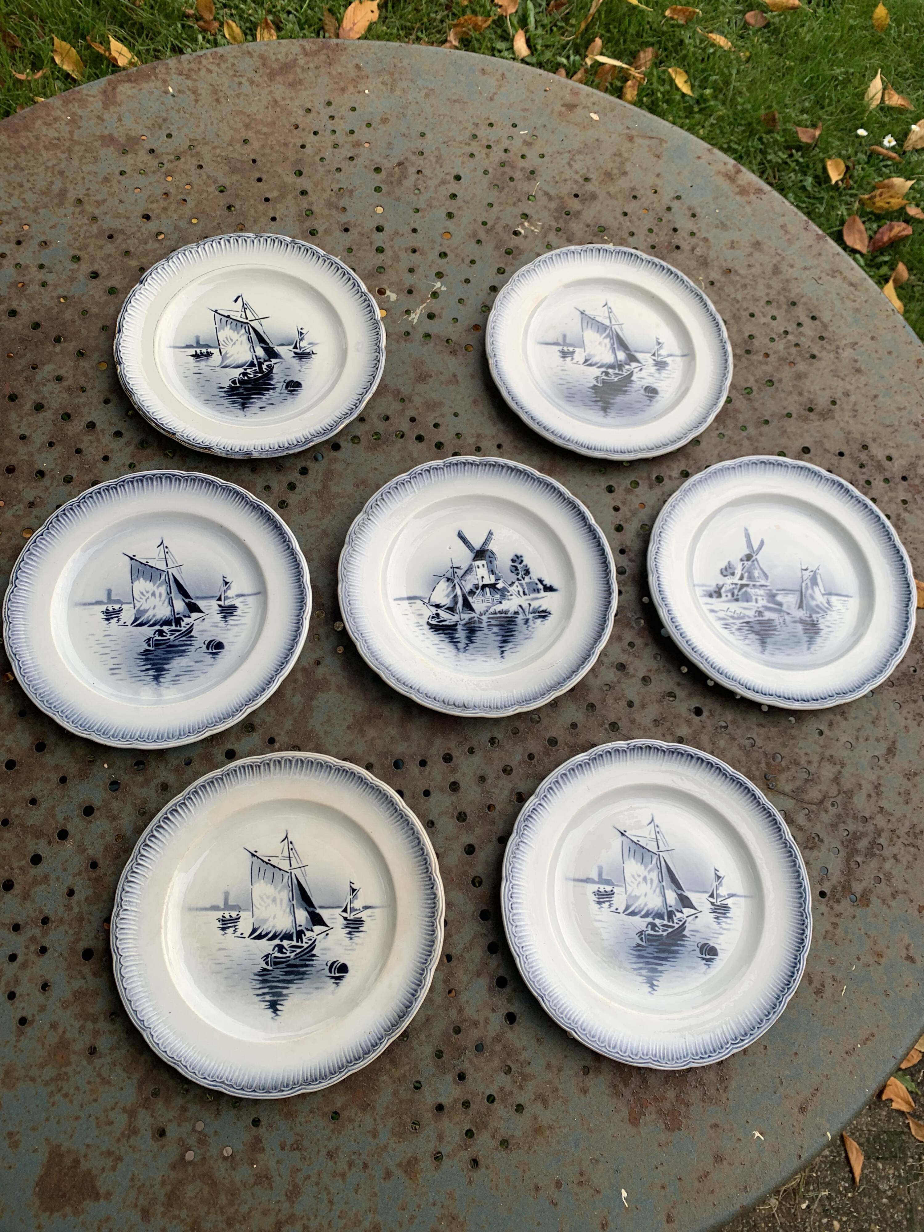 Set of 7 small dessert plates, Saint Amandinoire, Saint Amand decorated with sailboats