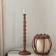 Turned wood lamp.