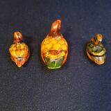 Trio of small ceramic ducks