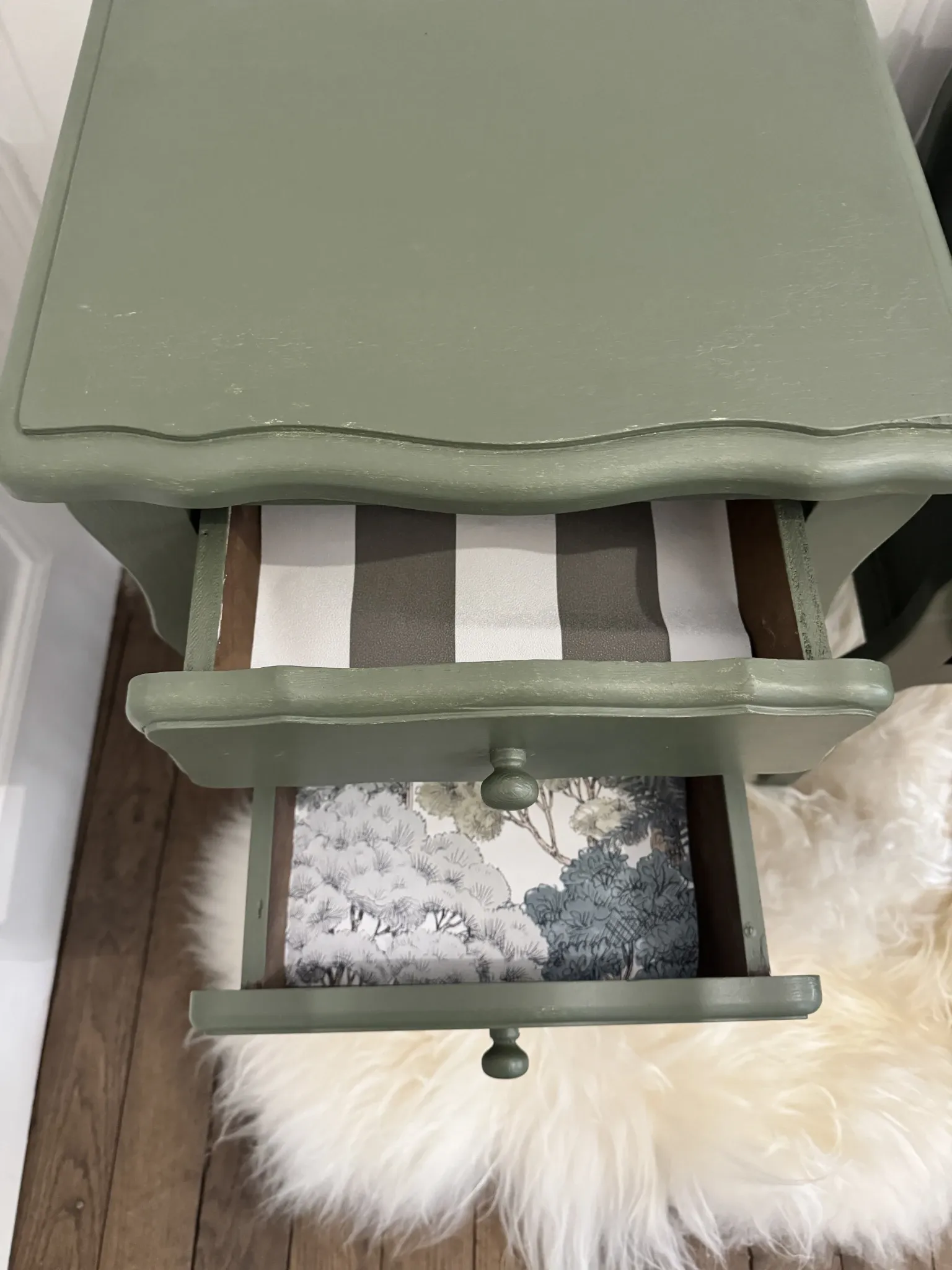 pair of wooden bedside tables