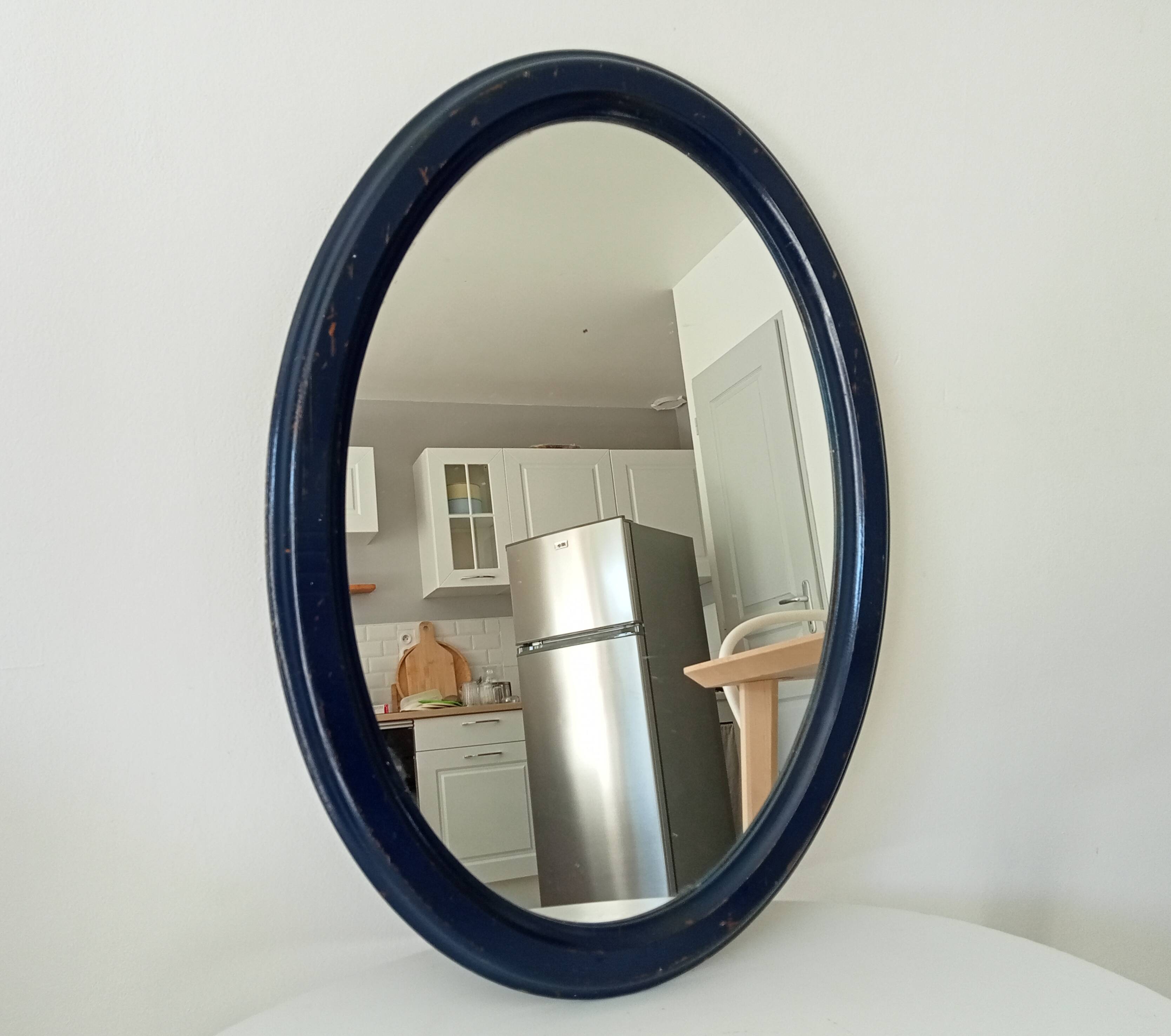 Vintage oval mirror in petrol blue wood