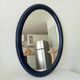 Vintage oval mirror in petrol blue wood