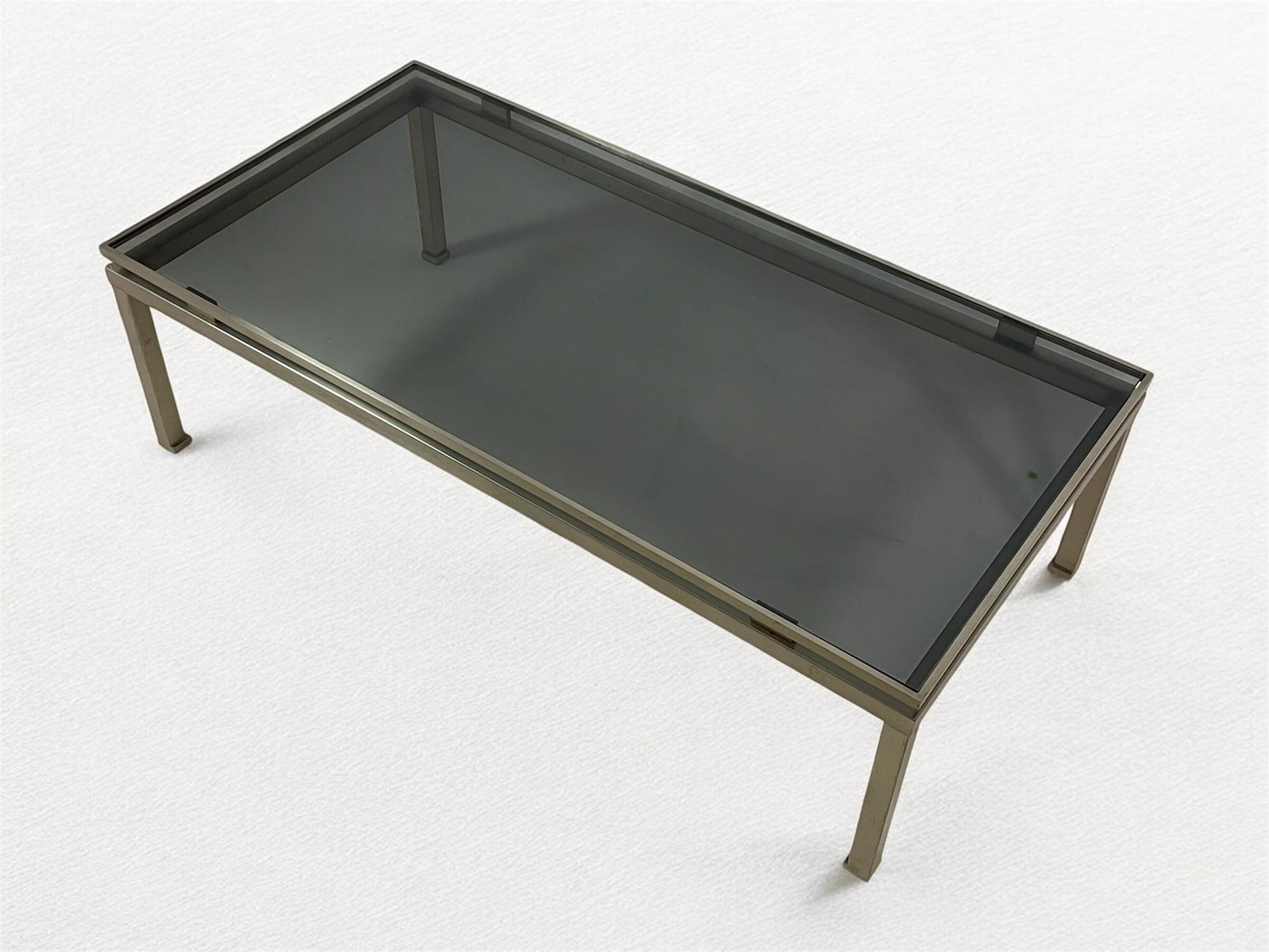 Brass coffee table with smoked glass top by Guy Lefevre, 1970s