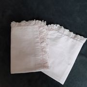 Old baby bed linen adornment