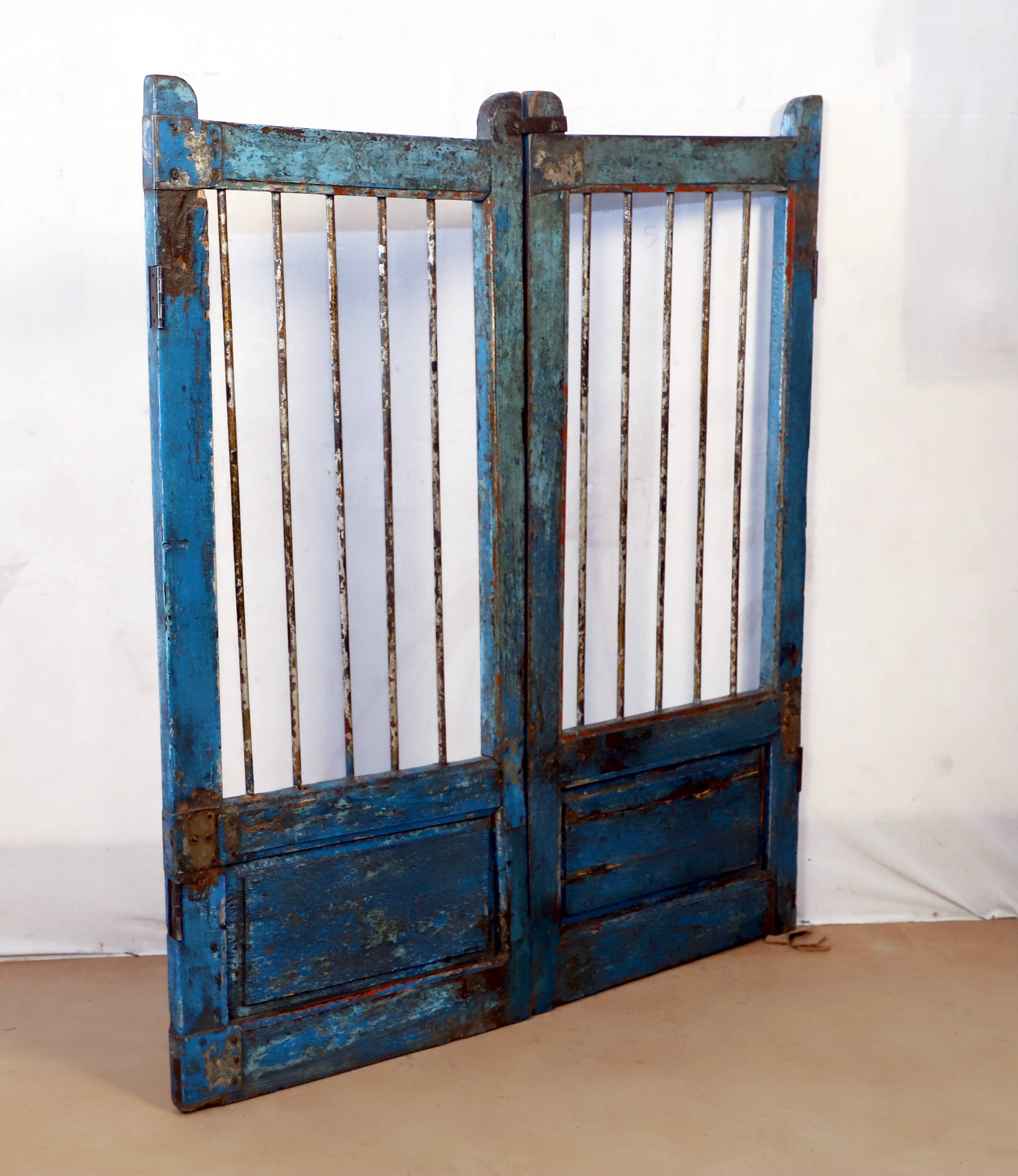 Old burmese teak gate with openwork wrought iron panels