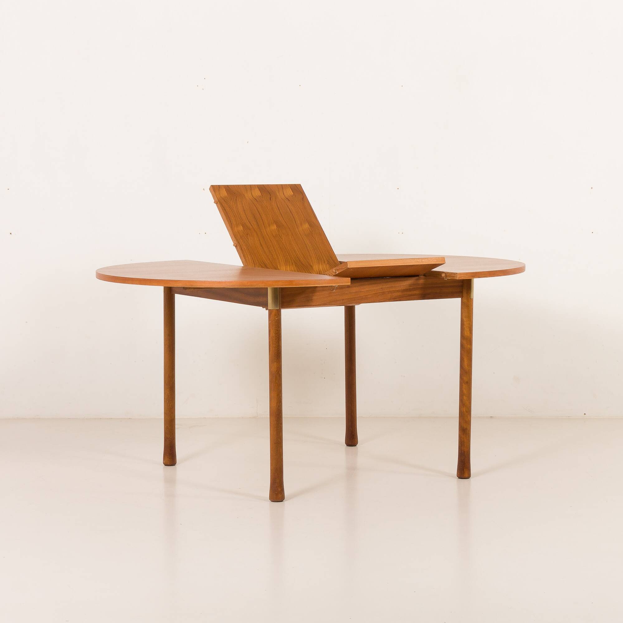 Italian mid-century round extension teak table with brass details, 1960s