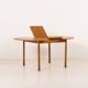 Italian mid-century round extension teak table with brass details, 1960s