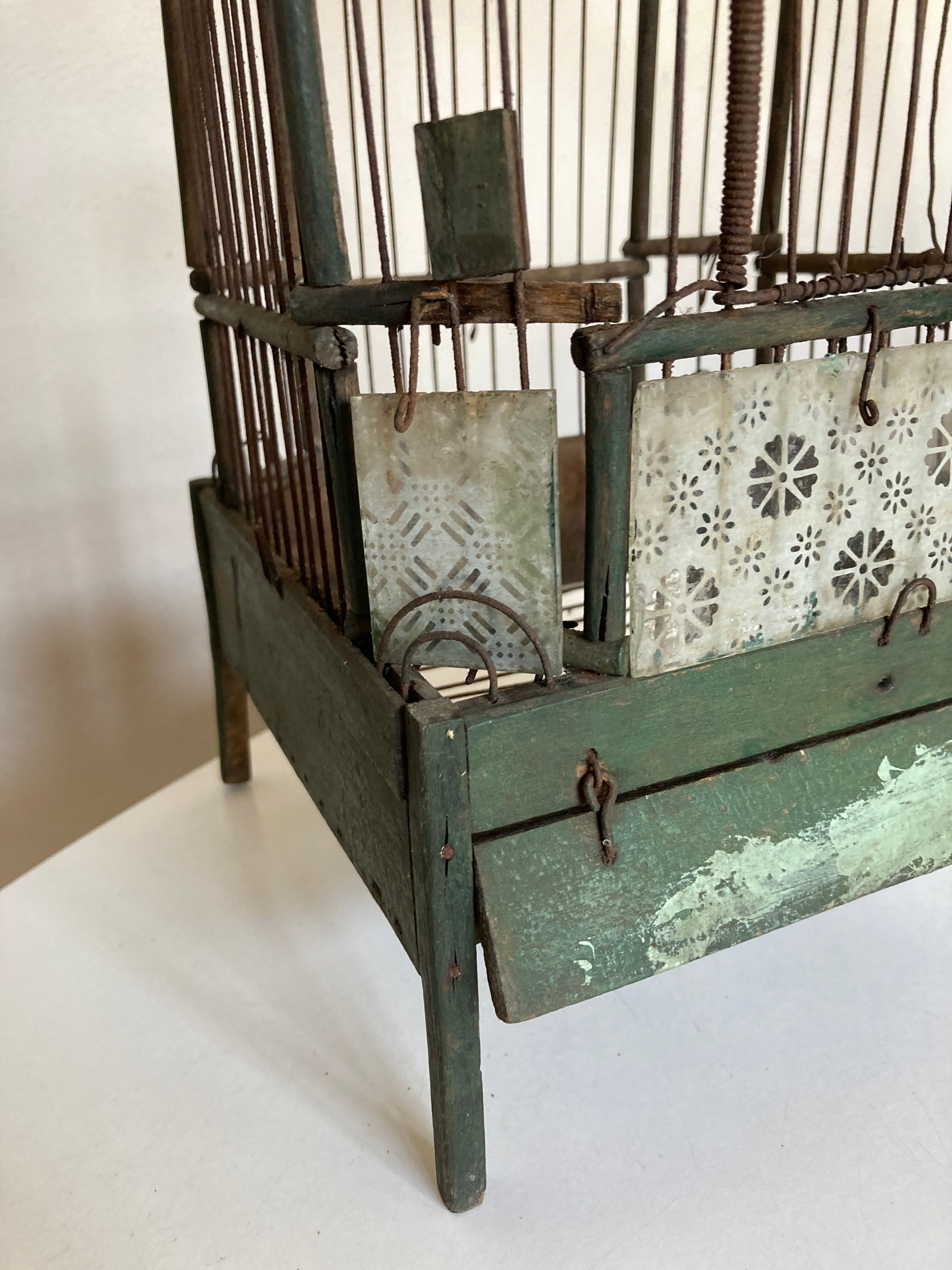 Octagonal bird cage made of wood and wire around 1920