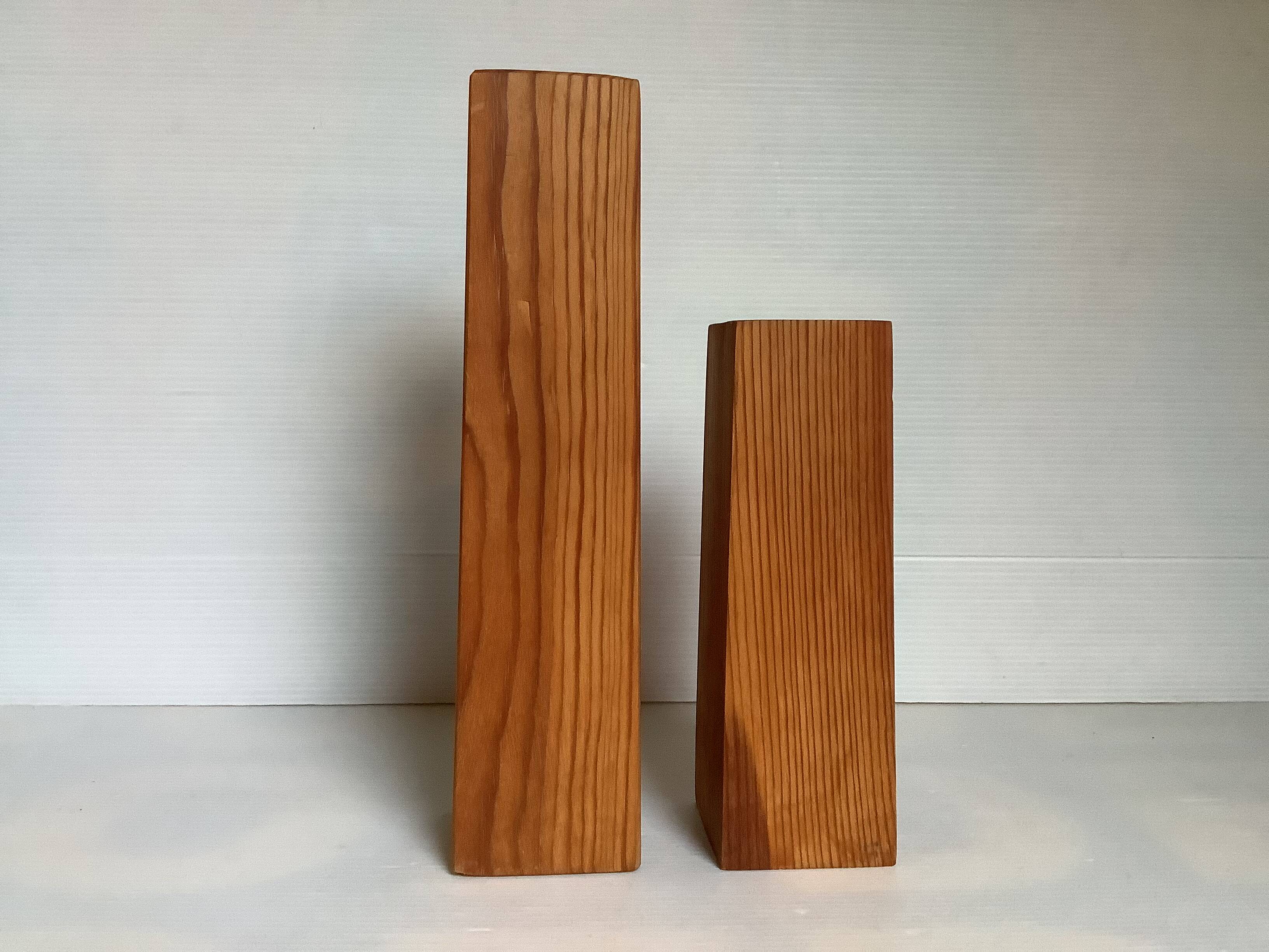 Pair of asymmetrical Scandinavian wooden candlesticks
