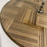 Vintage round wooden cheese board covered with glass plate with foldable handle