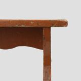 French rustic low church stool in terracotta painted wood, ca. 1900