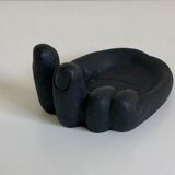 Empty pocket in Hawaiian lava in the shape of a hand signed Coco Joe, 1960