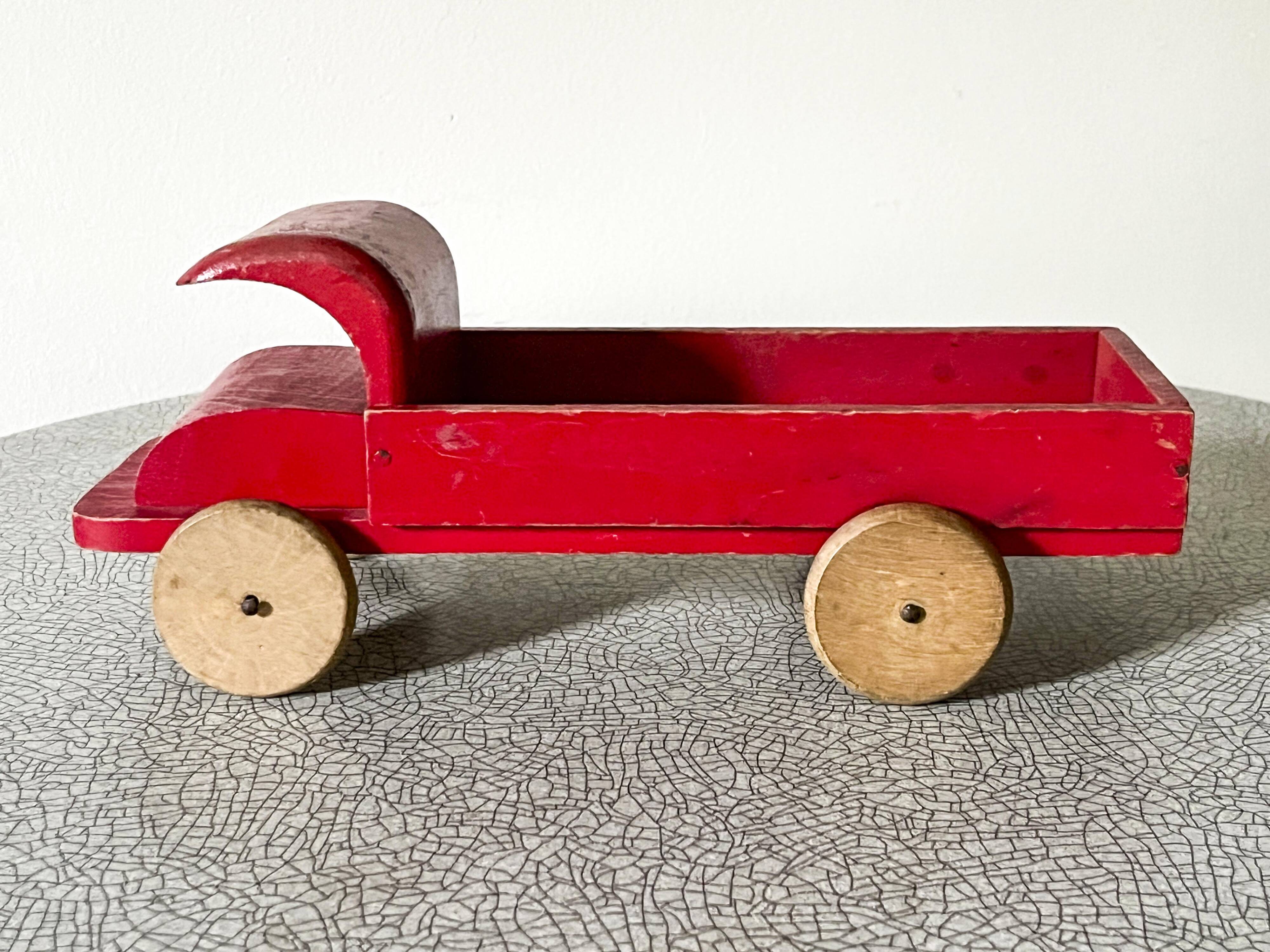 Red wooden flatbed truck, vintage toy