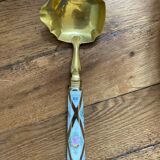 Ladle with earthenware reed