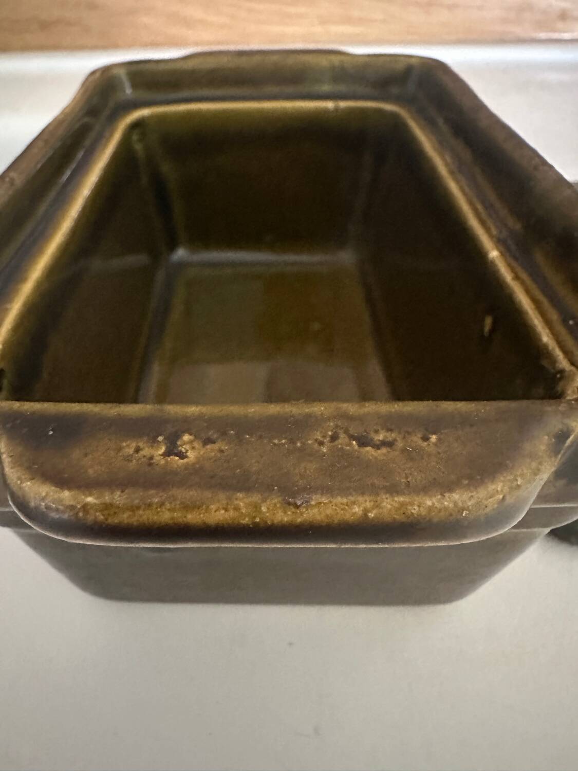 Vintage green majolica butter dish