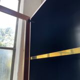 Mahey bookcase in elm and XXL brass