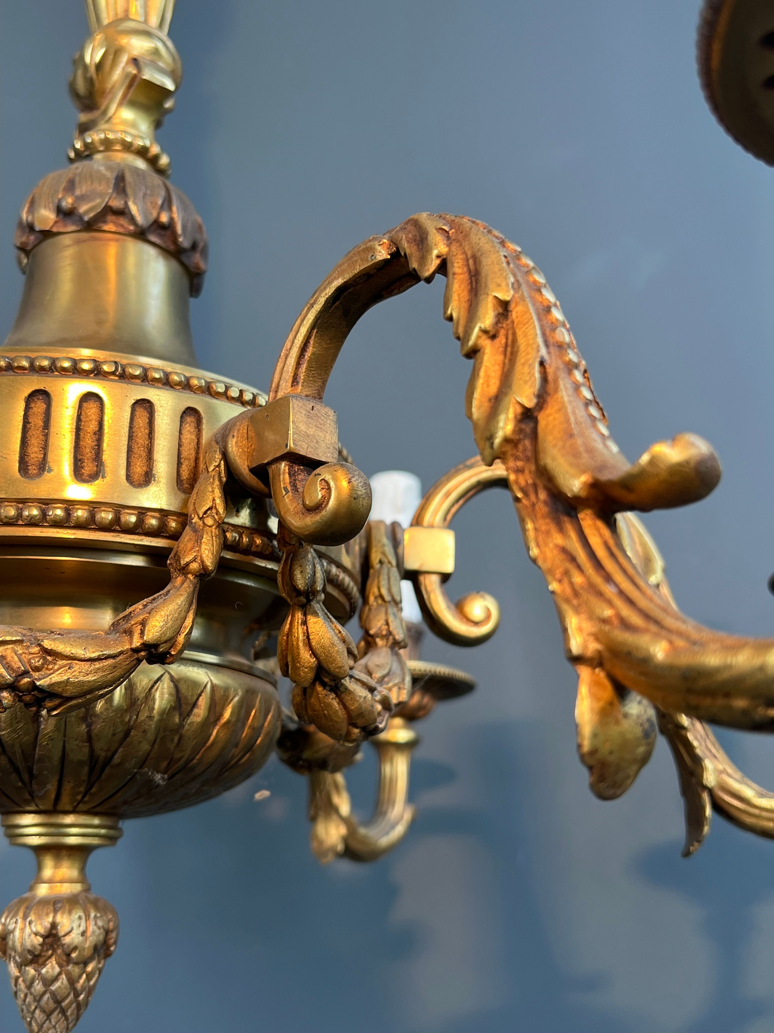 Bronze chandelier in Louis XVI style with 6 arms.
