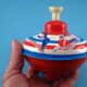 Vintage toy top M.H.
