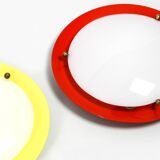 Three round 1950s wall or ceiling lamps made of metal and plexiglass shades