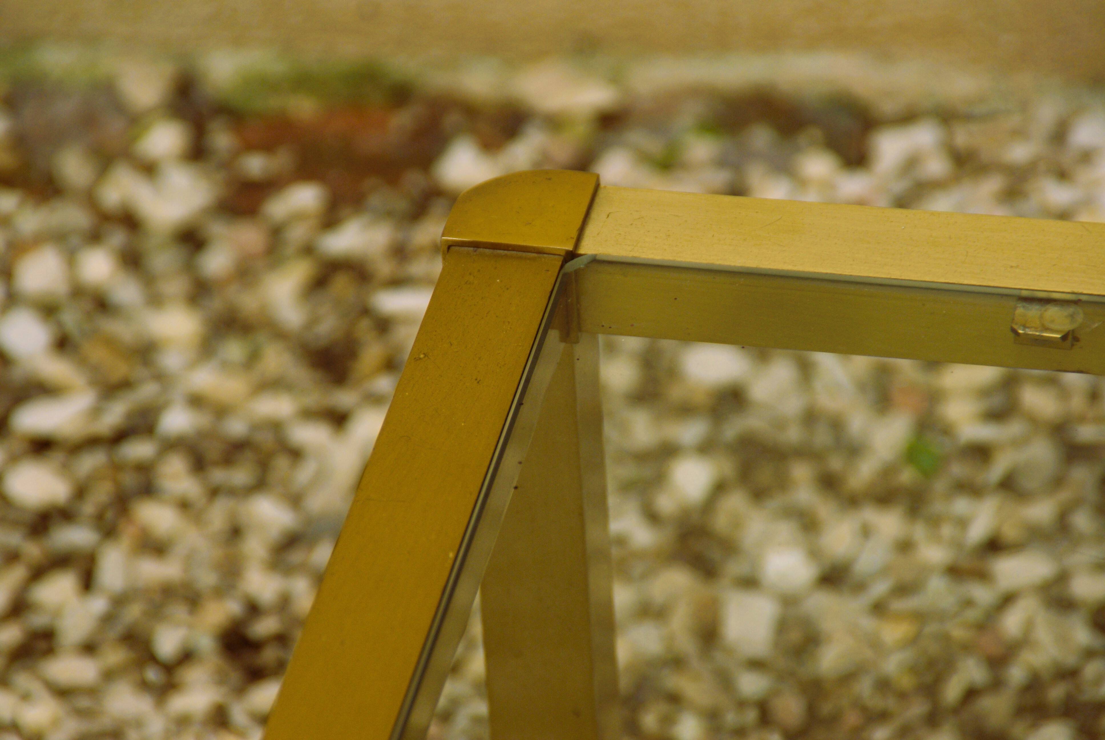 Roche Bobois coffee table in gilded brass and glass from the 70s
