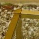 Roche Bobois coffee table in gilded brass and glass from the 70s
