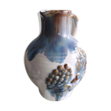 Small ceramic pitcher decorated with grapes