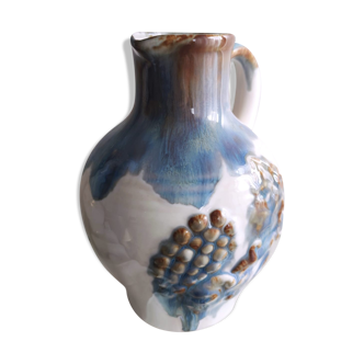 Small ceramic pitcher decorated with grapes