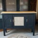 Buffet noir et cannage