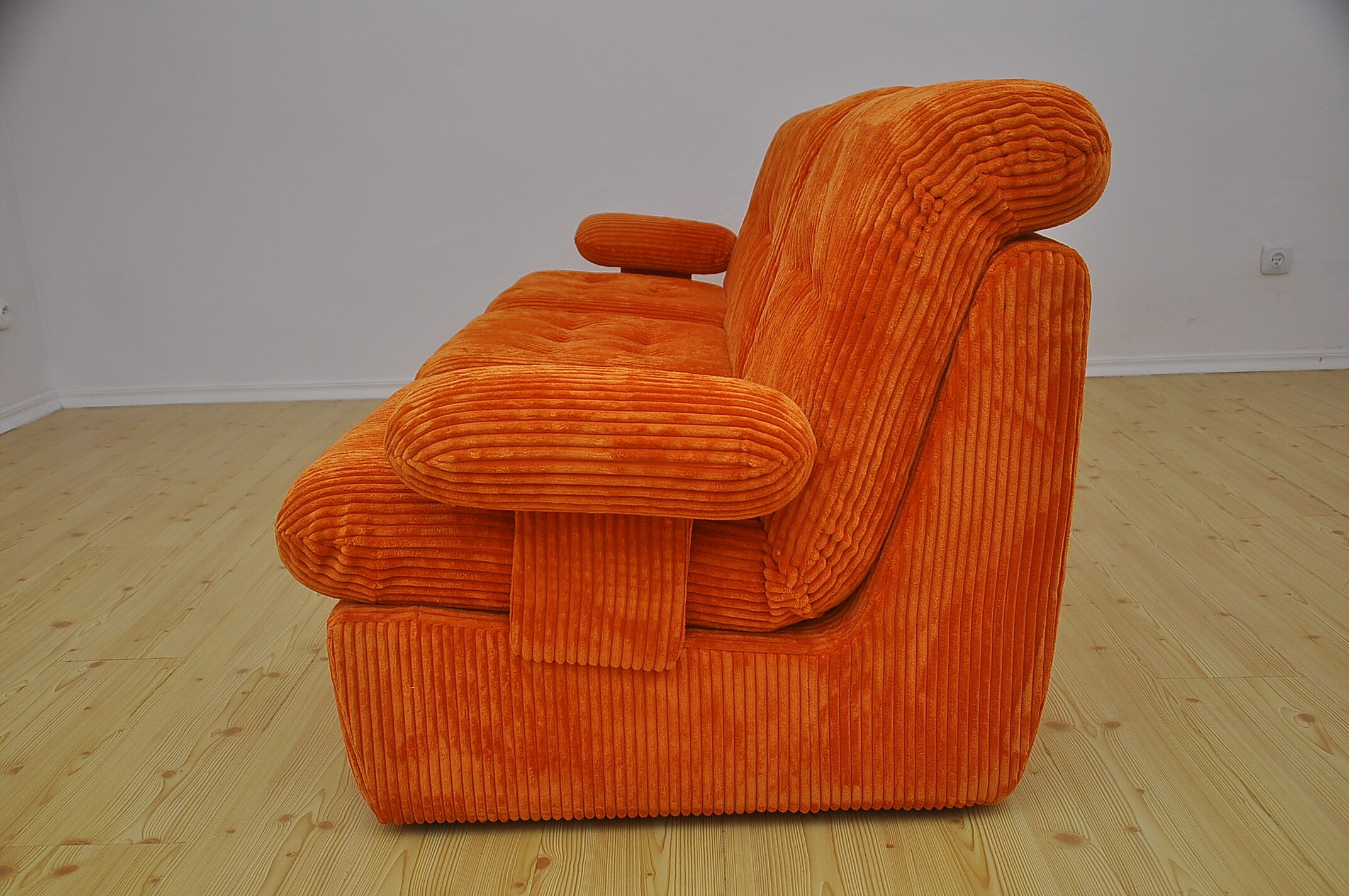 Orange corduroy modular sofa, 1970s.