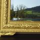 Antique mercury mirror in the Napoleon III style.