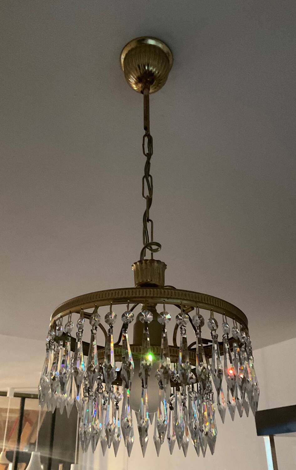 Cascade chandelier with crystal and brass tassels