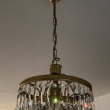 Cascade chandelier with crystal and brass tassels