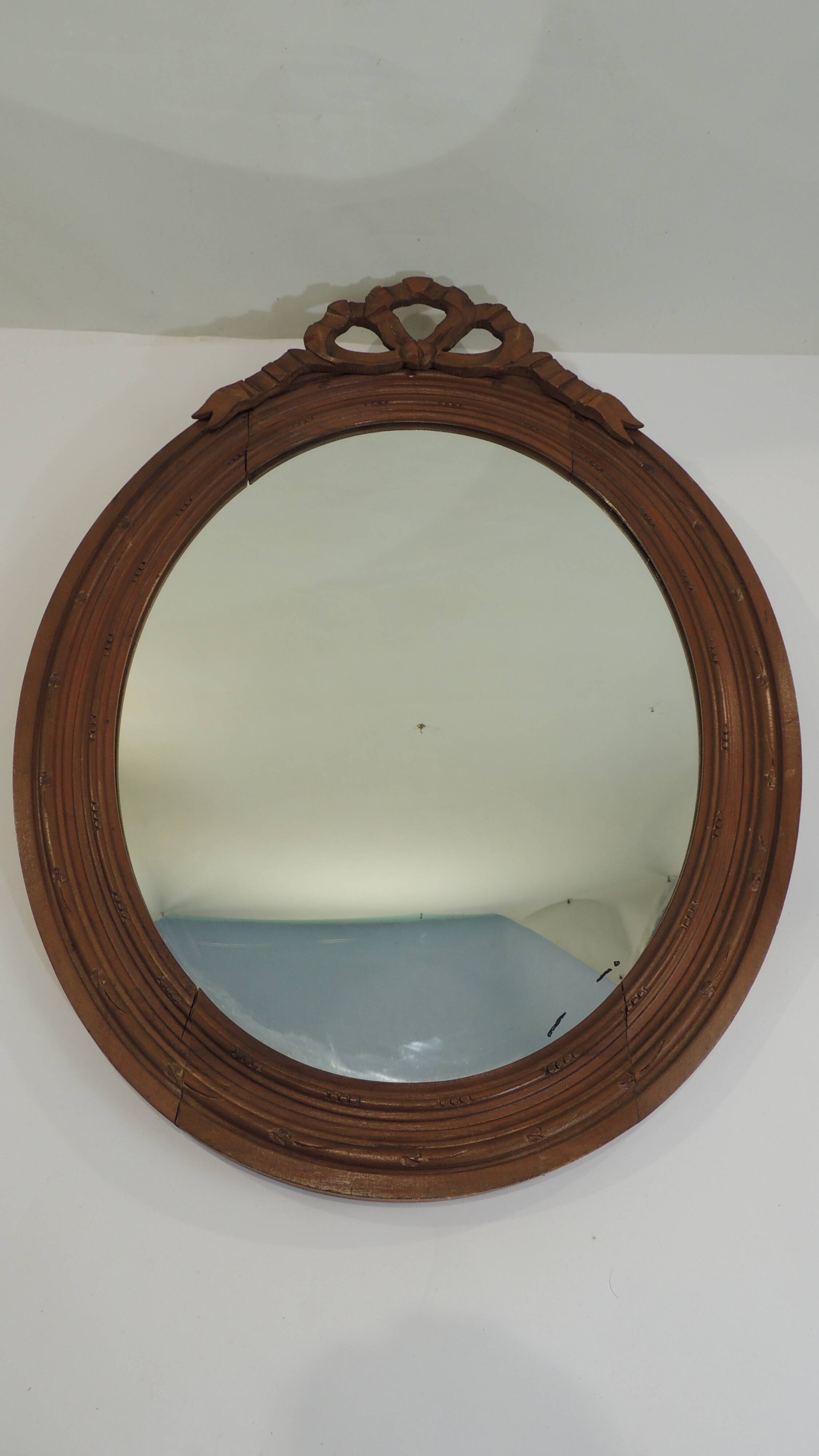 Antique oval mirror in carved wood – Louis XVI style, ribbon bow decoration, mid