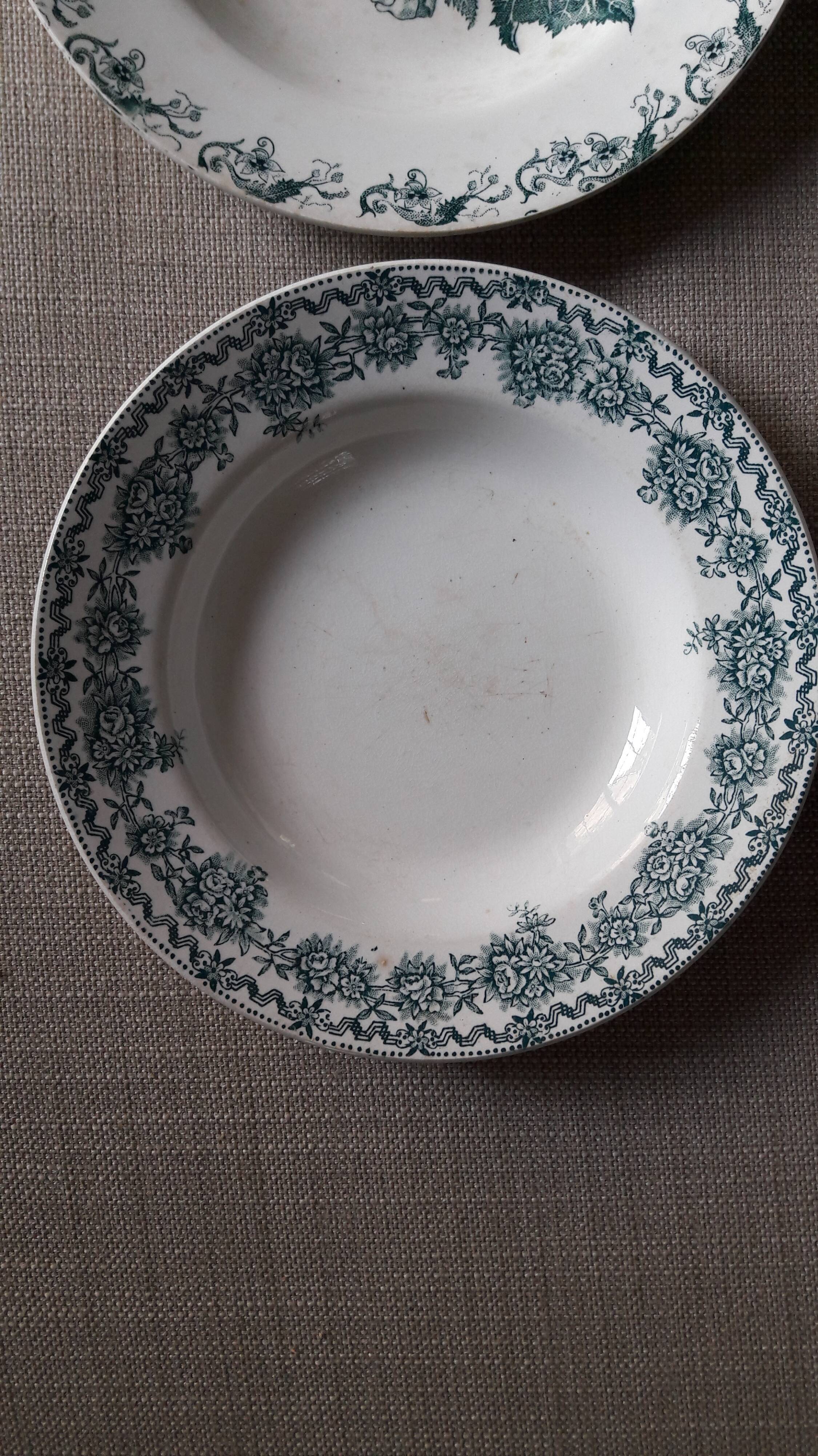 Lot of four mismatched hollow plates