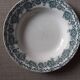 Lot of four mismatched hollow plates