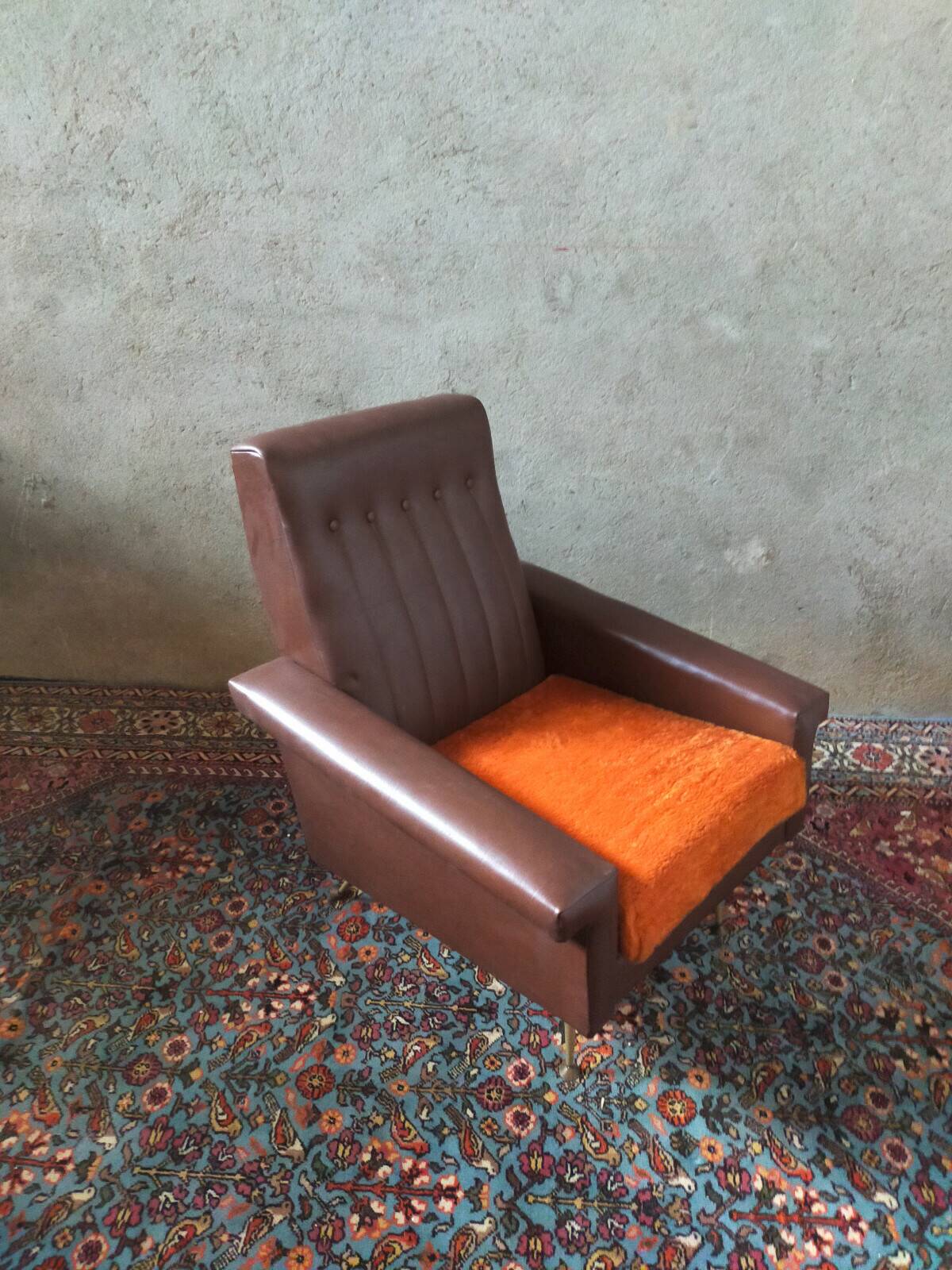 Vintage armchair in faux leather