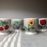 Ceramic shells with relief decoration of flowers (yellow and red) and fruits (cherries and grapes)