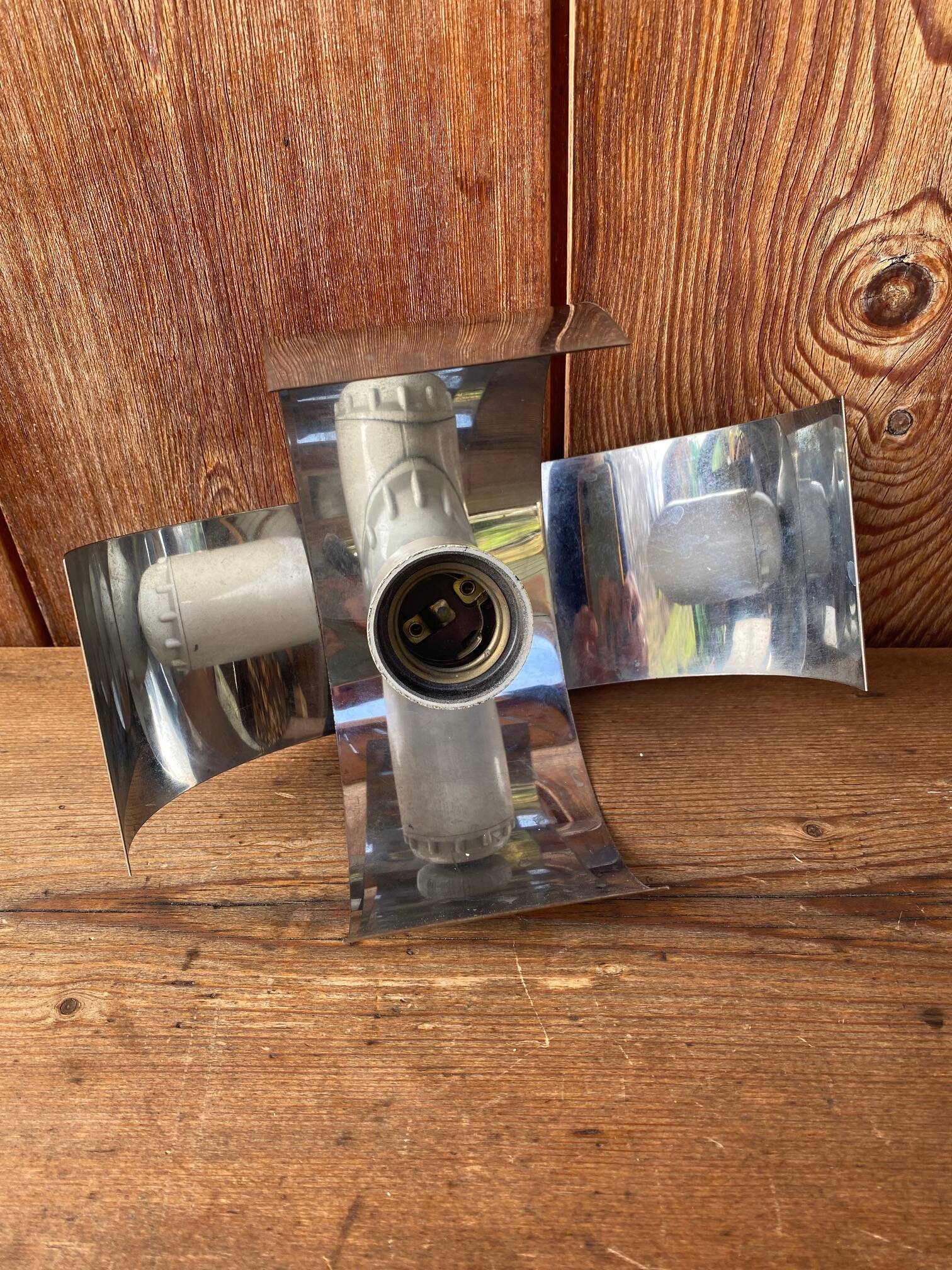 Applique space age chromé