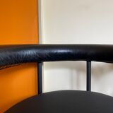 Pair of vintage leather basket armchairs