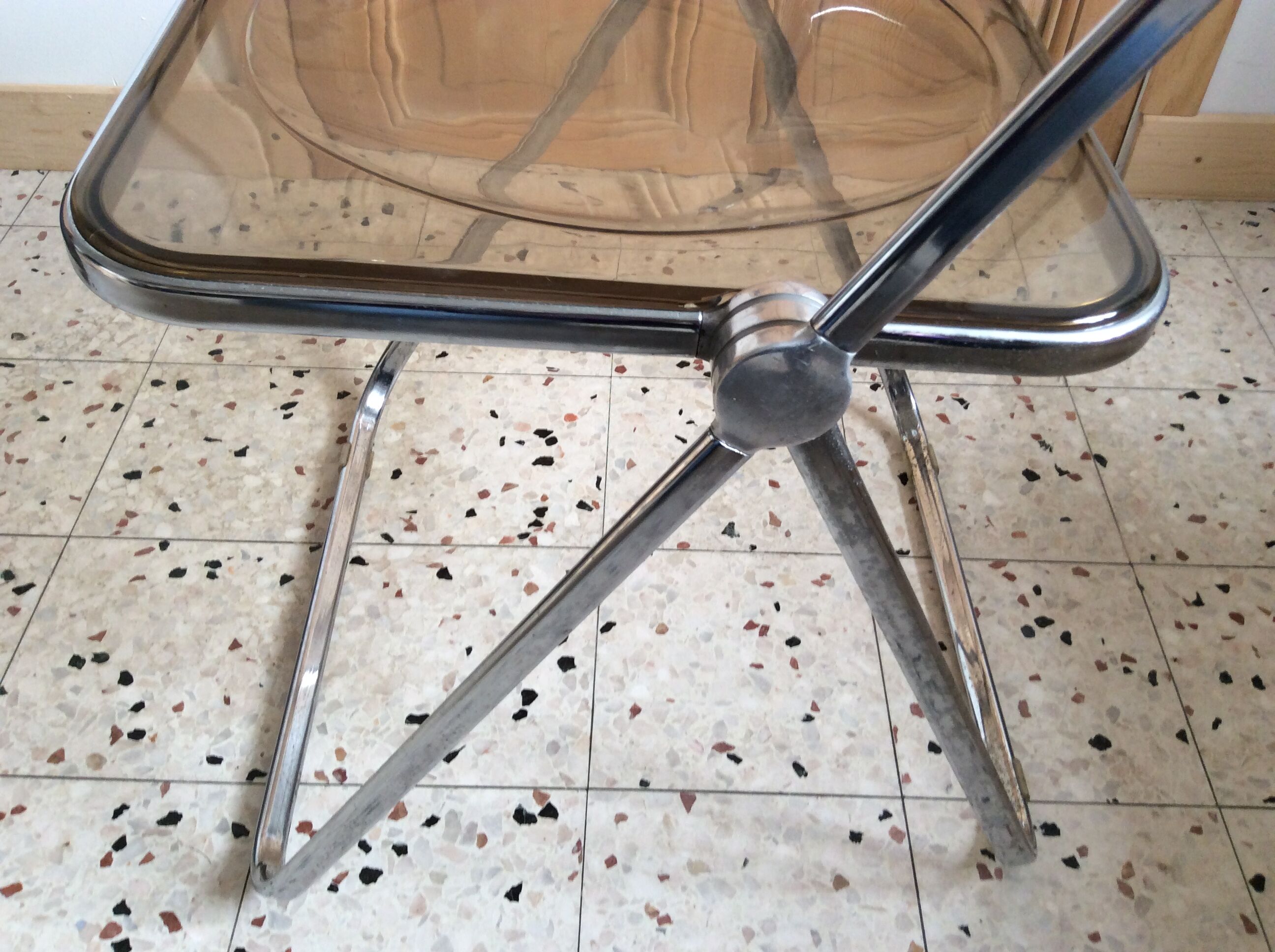 Folded chair by Giancardo Piretti for Castelli