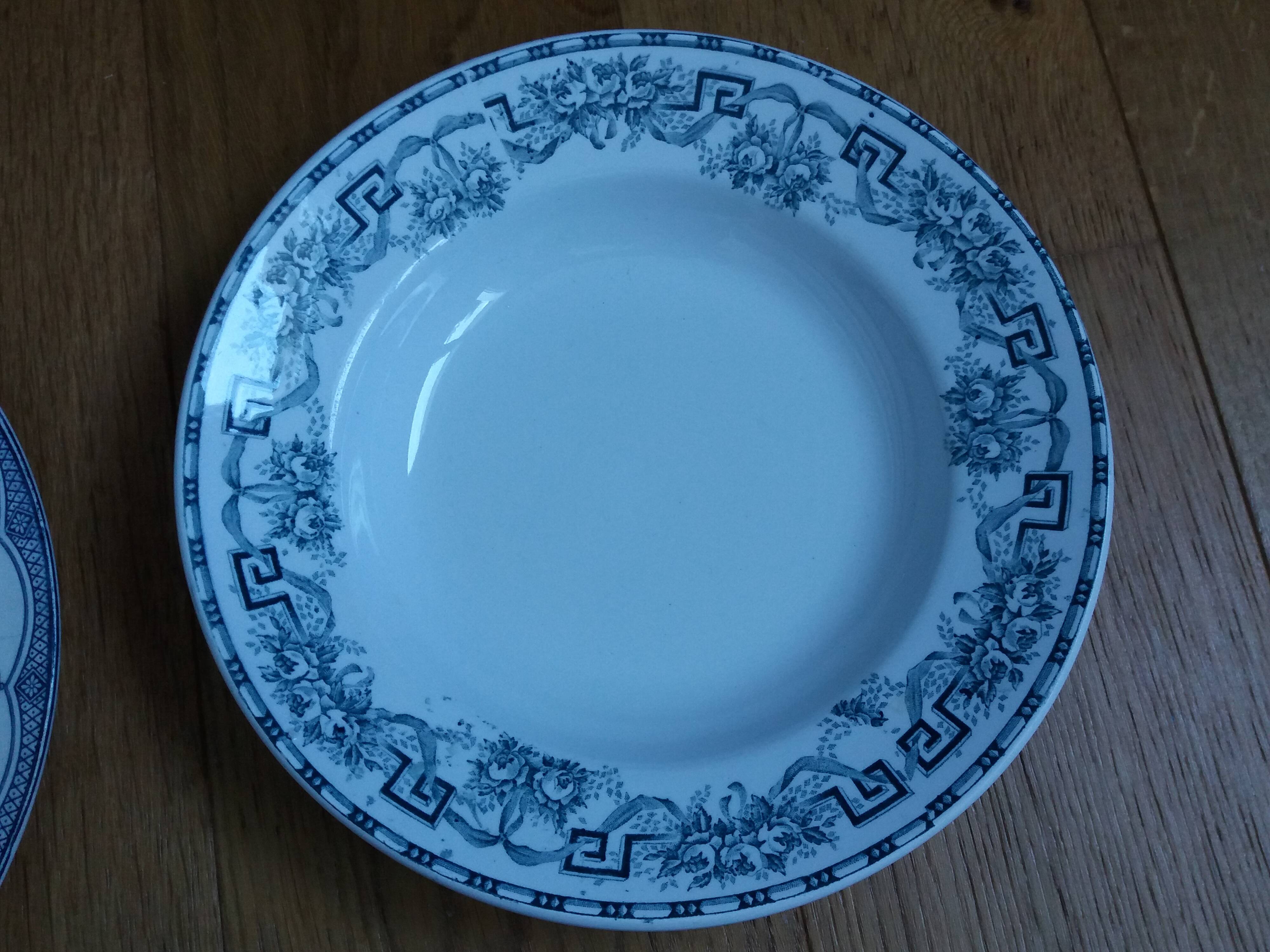 Old green and blue mismatched plates from Digoin, Salins, Moulin des Loups