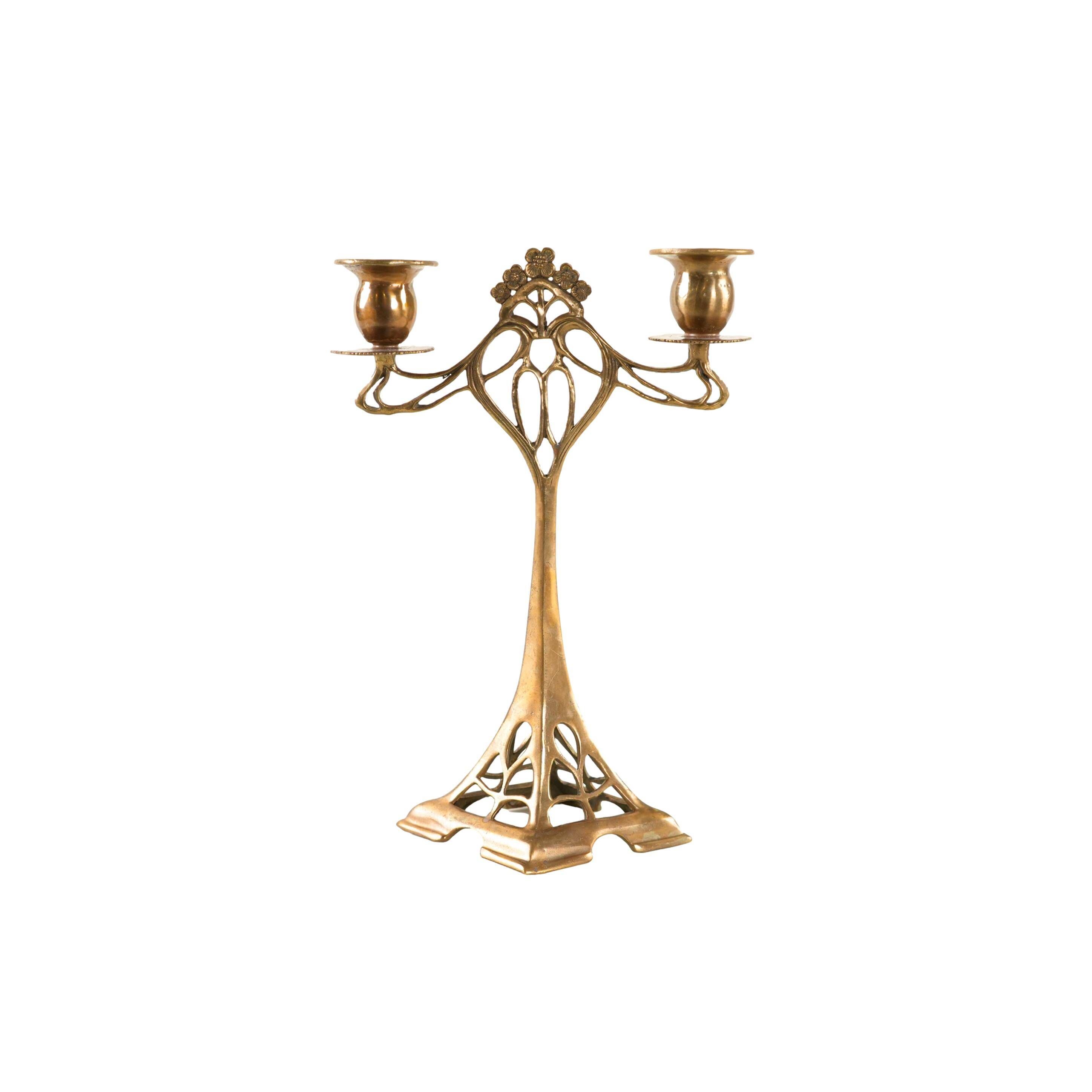Art Nouveau brass candlestick with floral ornamentation, two arms, European