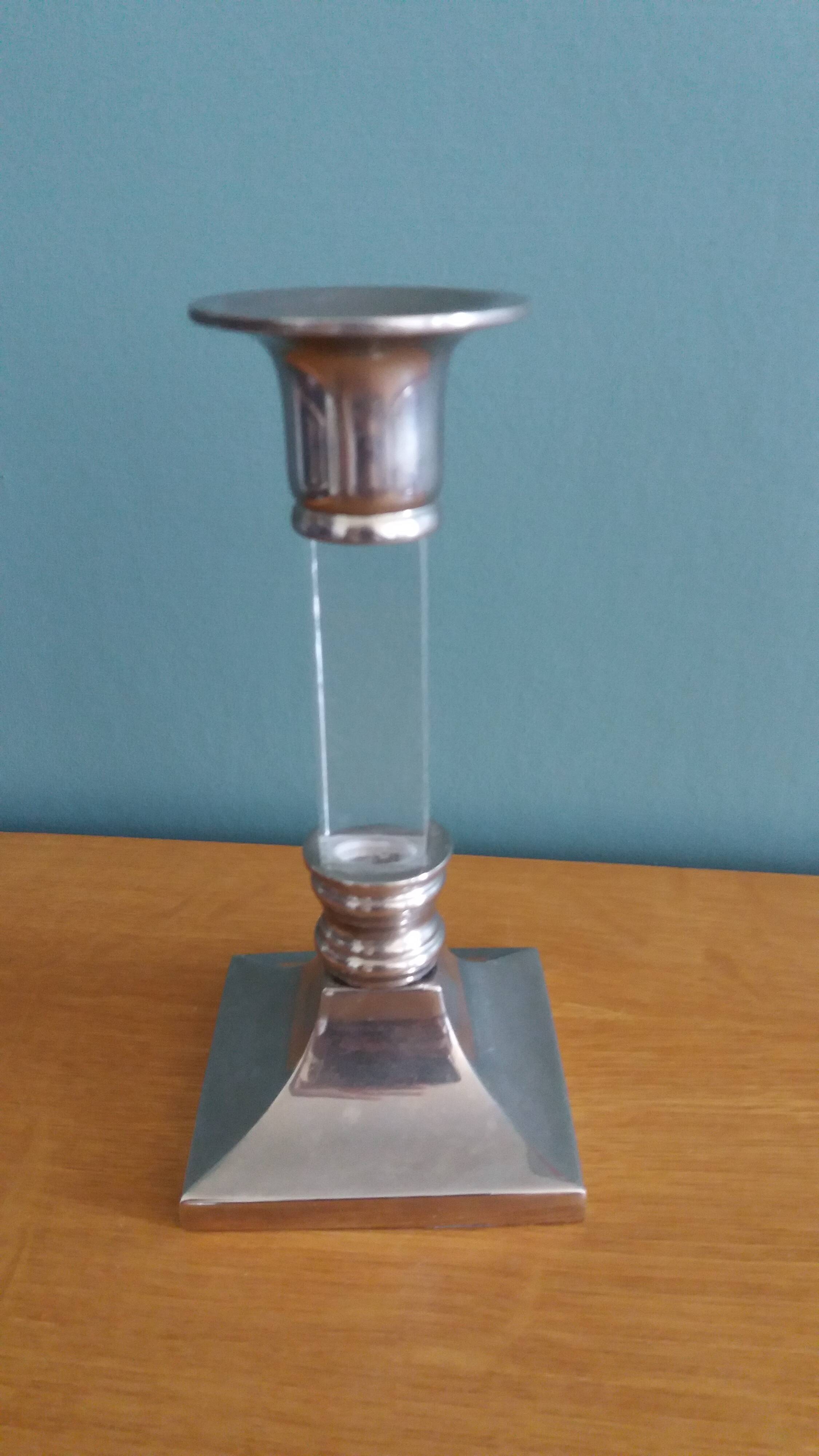 Silver-plated metal candlestick and lucite plexiglass