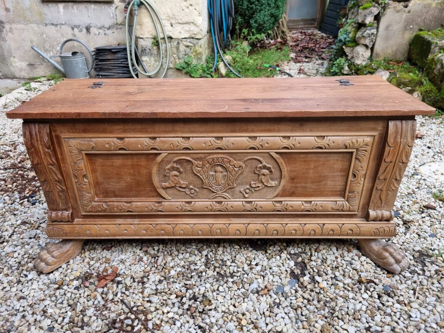 Wooden chest with lion paws