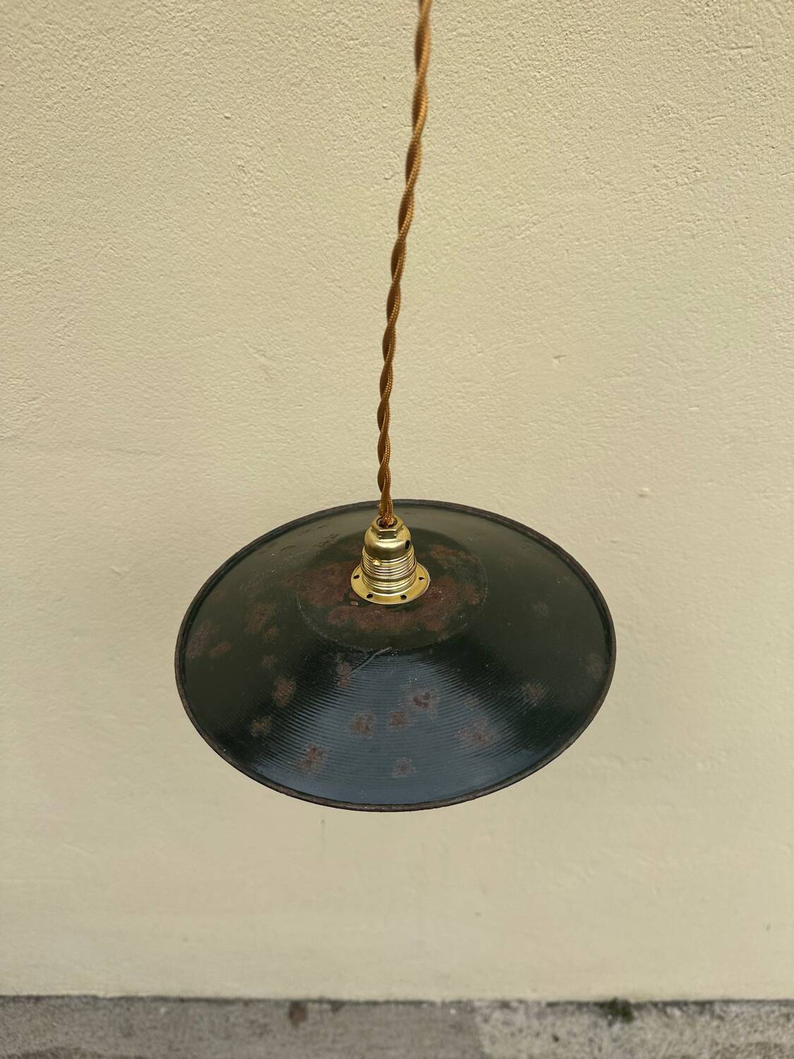 Old industrial black and white vintage enameled sheet metal pendant light