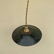 Old industrial black and white vintage enameled sheet metal pendant light