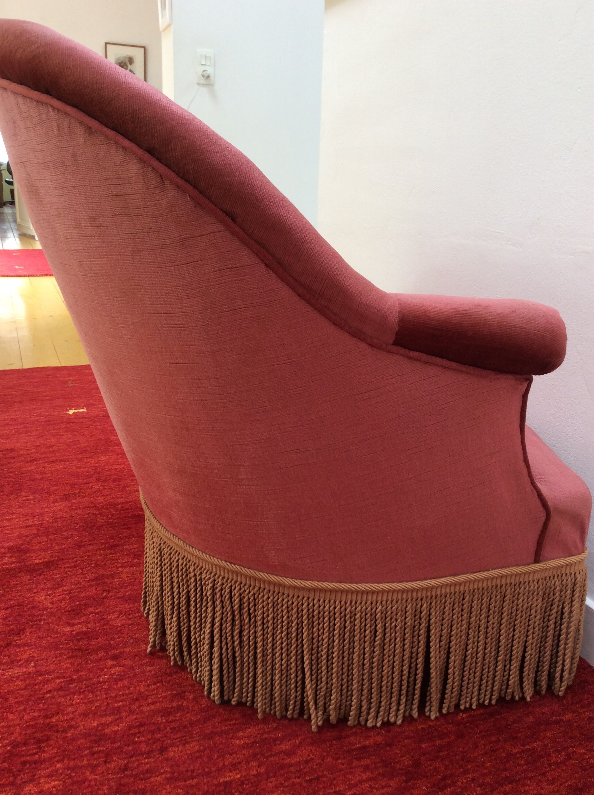 Toad in powder pink velvet armchair