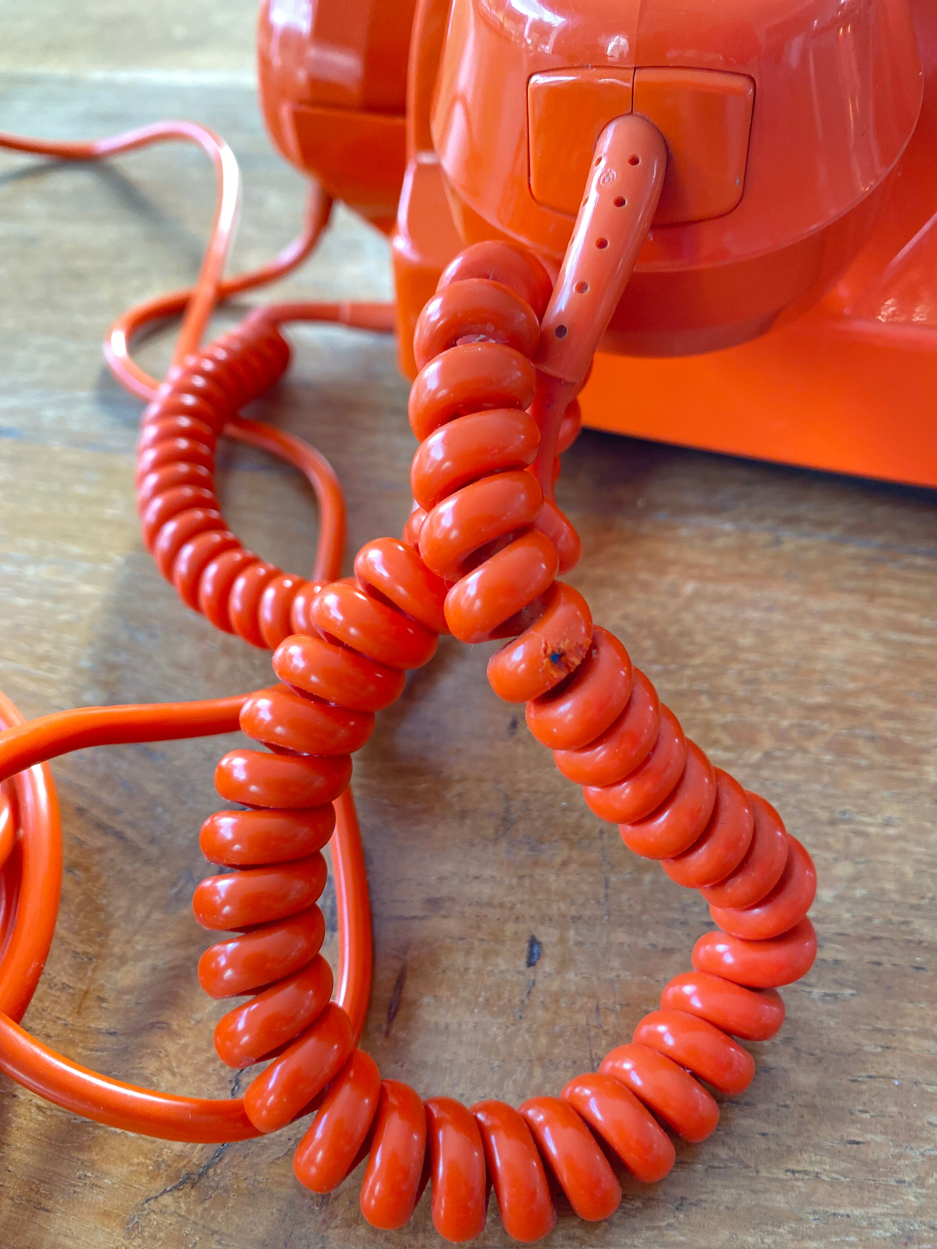 Vintage orange dial phone